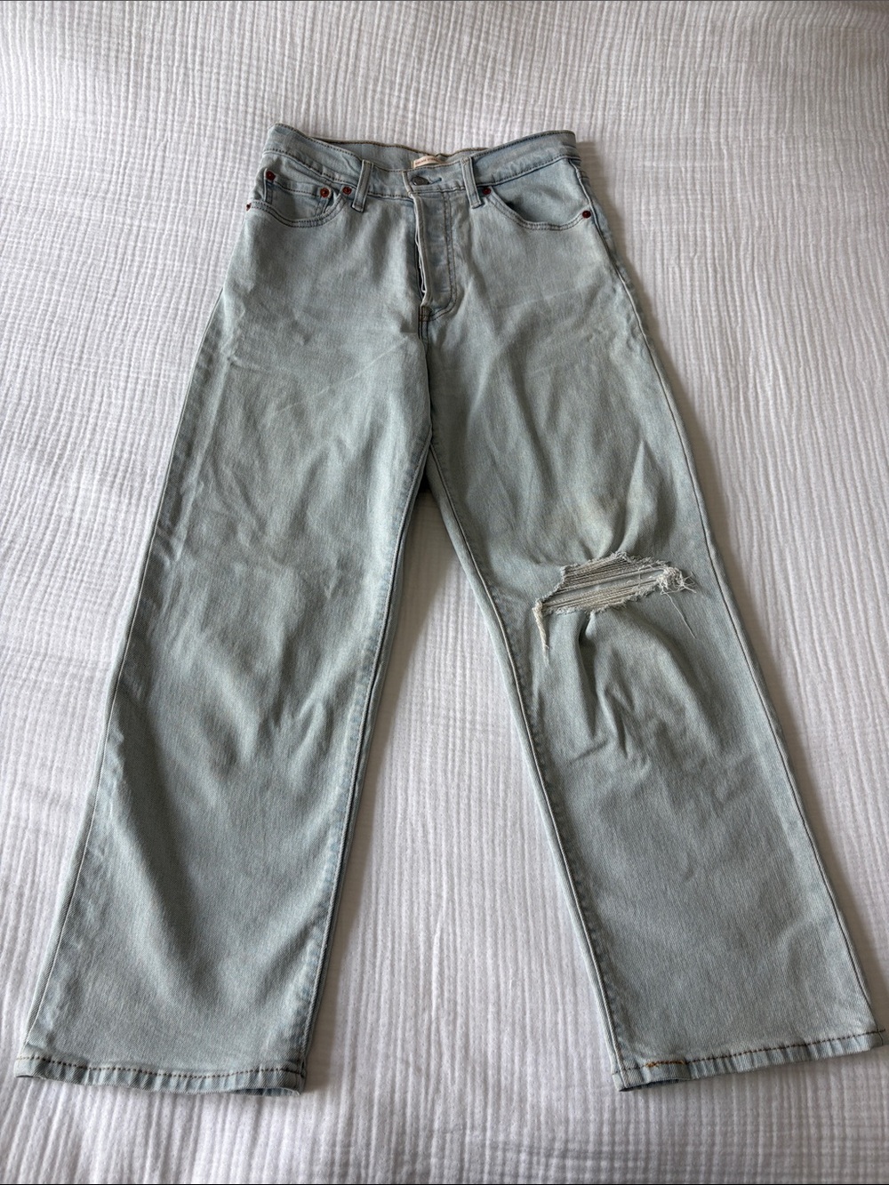 Levi's Light Blue Straight Leg Jeans with Knee Rip